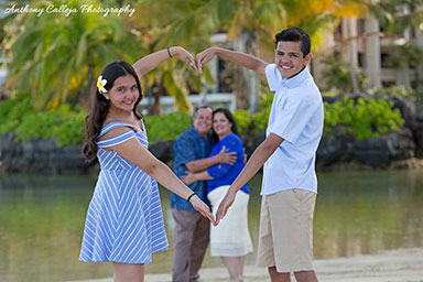 family photo session near the Rainbow Tower at Hilton Hawaiian Village Waikiki